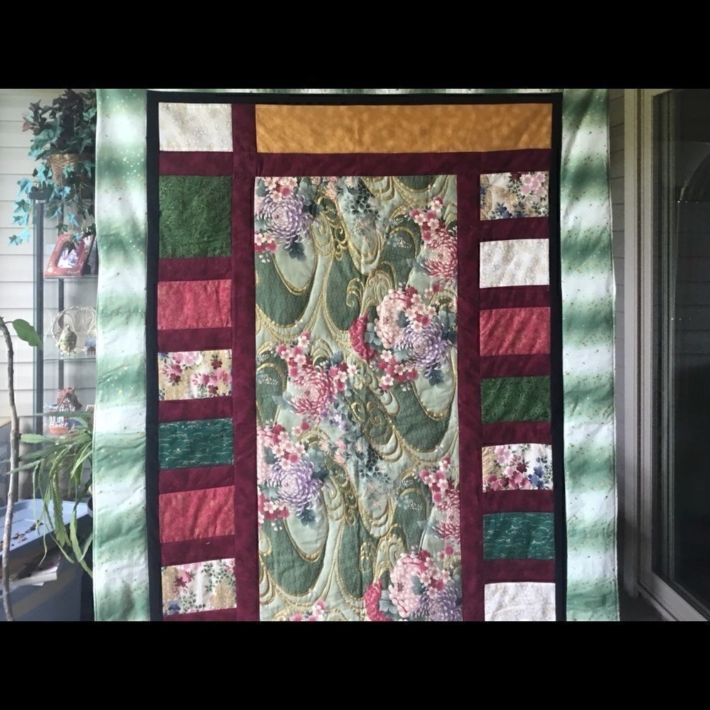 Handmade Lap Quilt. 43” x 63”